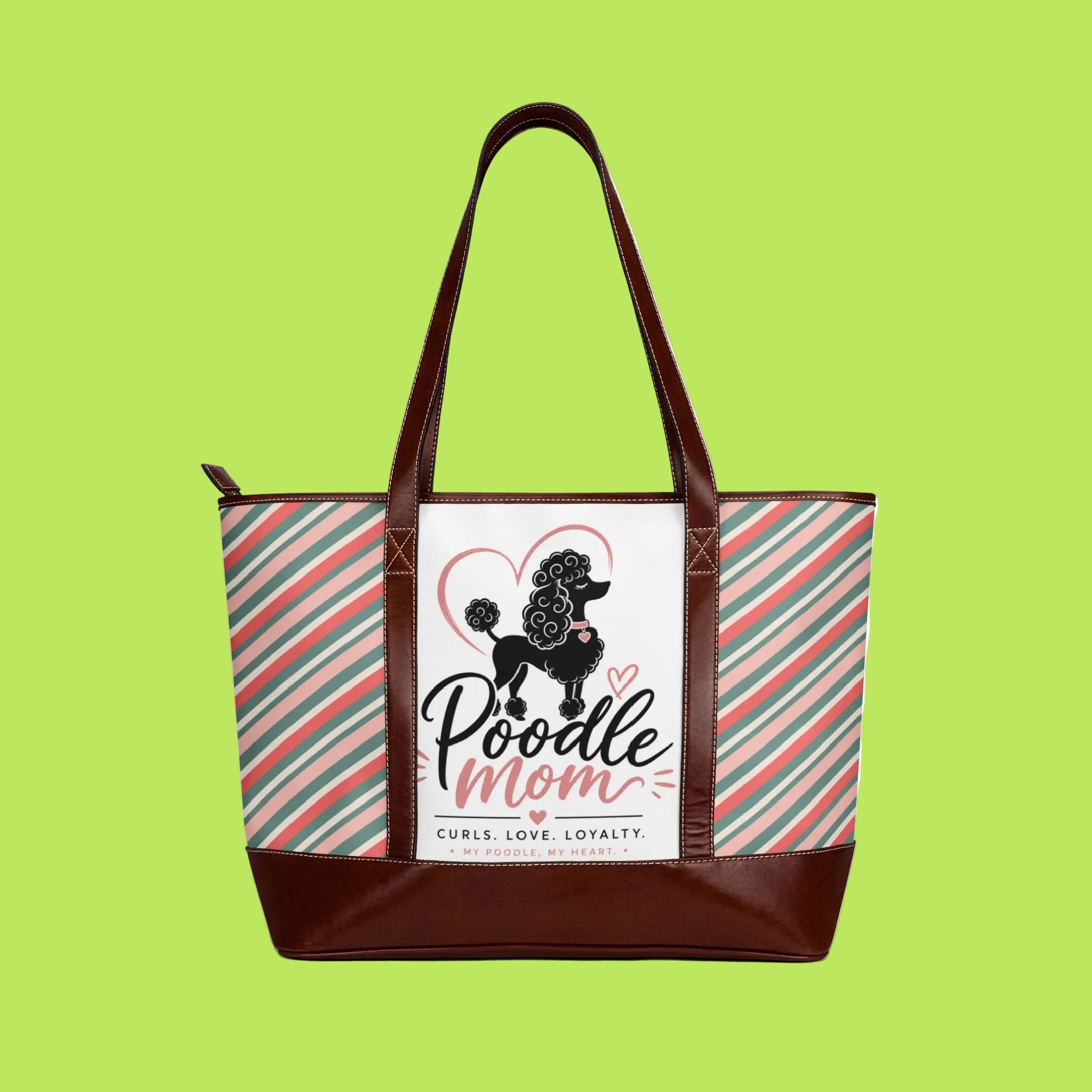 A tote bag with dark brown faux-leather trim and handles, featuring a white front panel with a black poodle graphic, pink heart outline, and the words 'Poodle Mom' and 'Curls. Love.